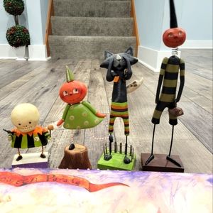 Janell Berryman figurines and Halloween wall canvas